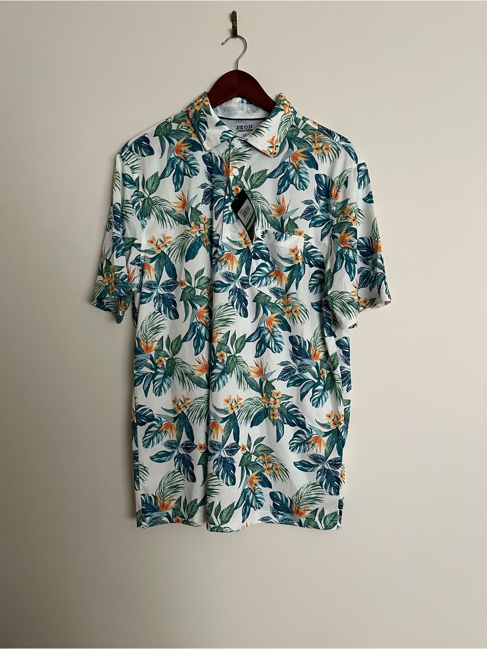 Izod Men’s White Tropical Floral Short Sleeve Polo with Green and Orange Leaves